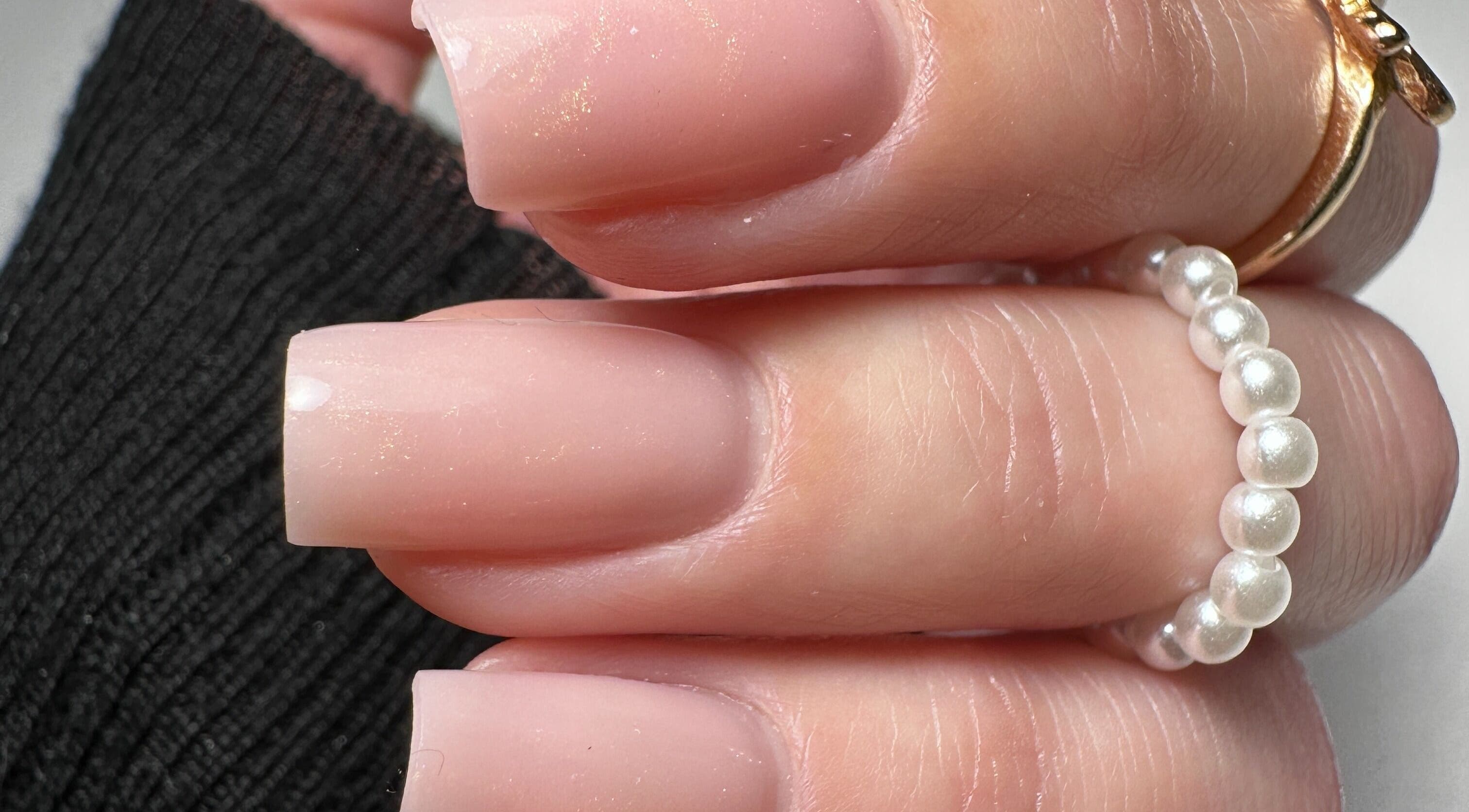 Elegant nude nails with pearl ring, SBI SALON, Englishtown, New Jersey, US.