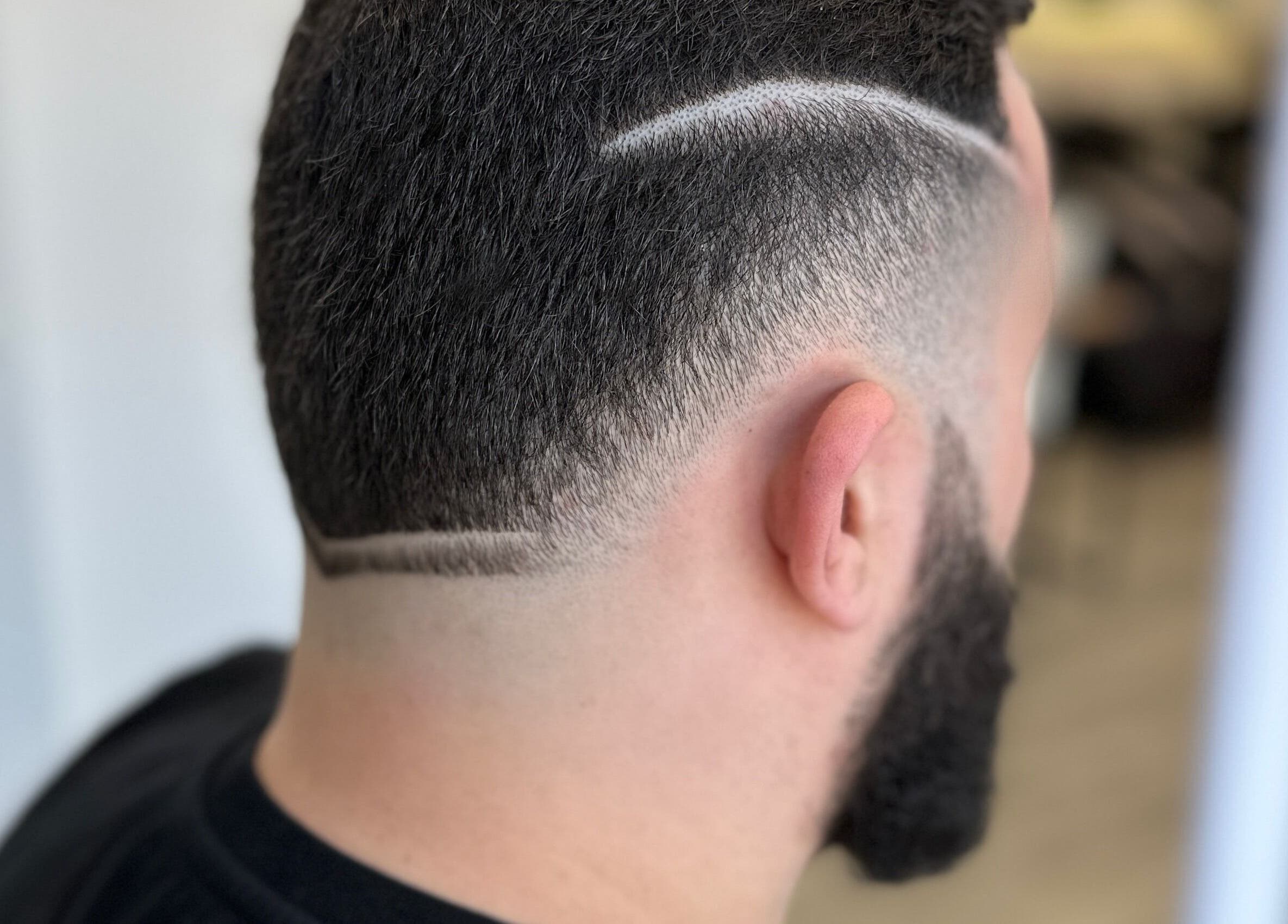 Detailed close-up of a trendy fade haircut design at SBI SALON, Englishtown, New Jersey, US.