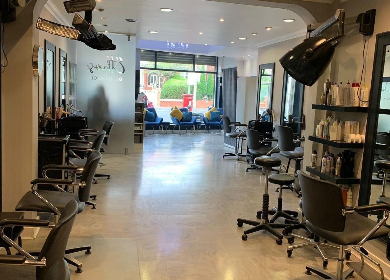 Stylish interior of Ethos Blackpool salon, showcasing chic decor and modern styling chairs in Blackpool, England, GB.