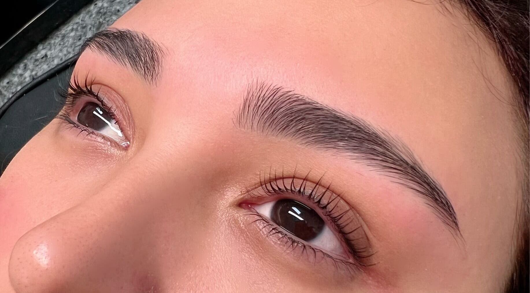 Close-up of expertly shaped brows at Luvvi, Surfers Paradise, Queensland, AU, showcasing beauty precision.