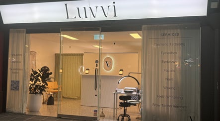 Entrance to Luvvi beauty venue in Surfers Paradise, Queensland, AU, showcasing services and modern decor.