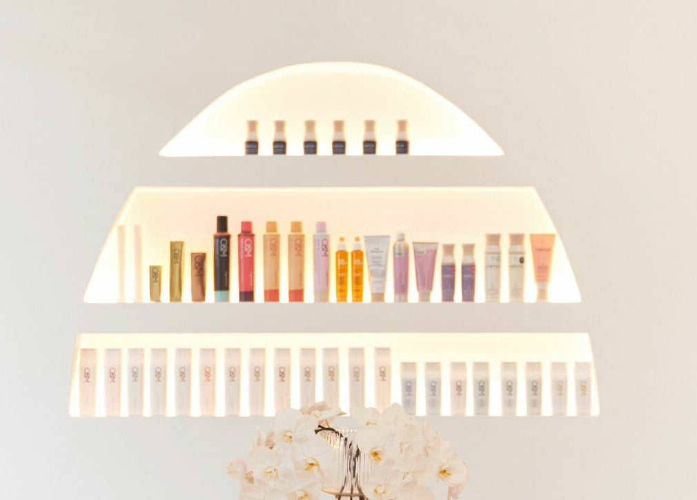 Stylish wall shelves at Blondie Bar Salon in Melbourne, Victoria, AU showcasing beauty products.