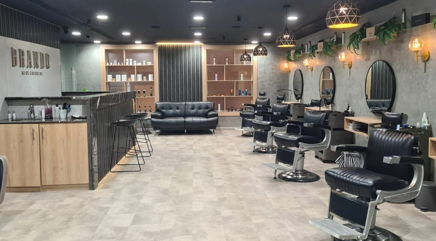 Modern interior of Brando Gents Salon, Dubai, Dubai, AE with sleek barber chairs and stylish decor.