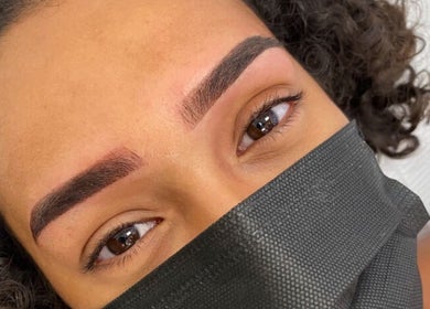 Close-up of expertly shaped eyebrows at Solara Beauty, Toronto, Ontario, CA. High-quality grooming service.