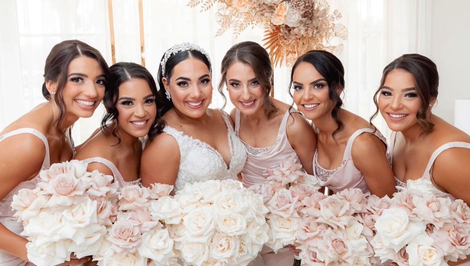 Bridal party with elegant bouquets at GlowbyBeca, Wilton, New South Wales, AU.