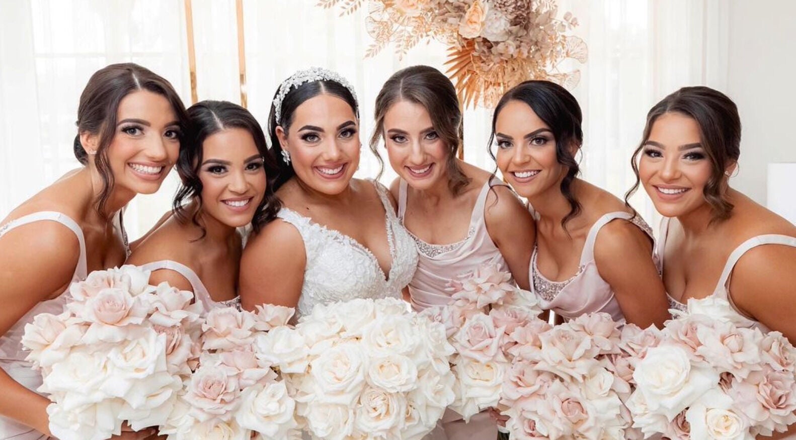 Bridal party with elegant bouquets at GlowbyBeca, Wilton, New South Wales, AU.