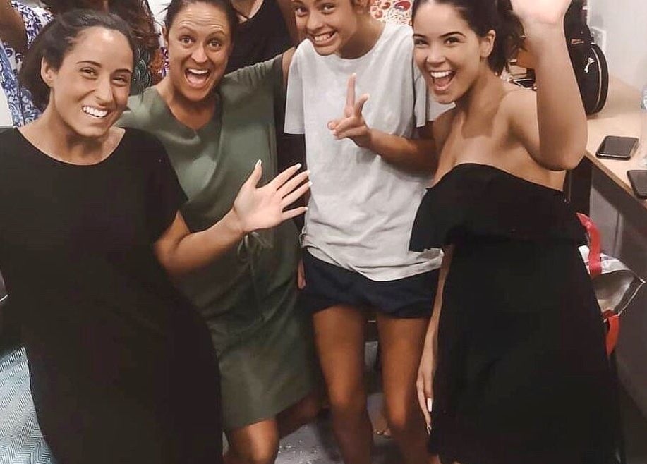 Group celebrating at GlowbyBeca, Wilton, New South Wales, AU, showcasing joyful atmosphere and community spirit.