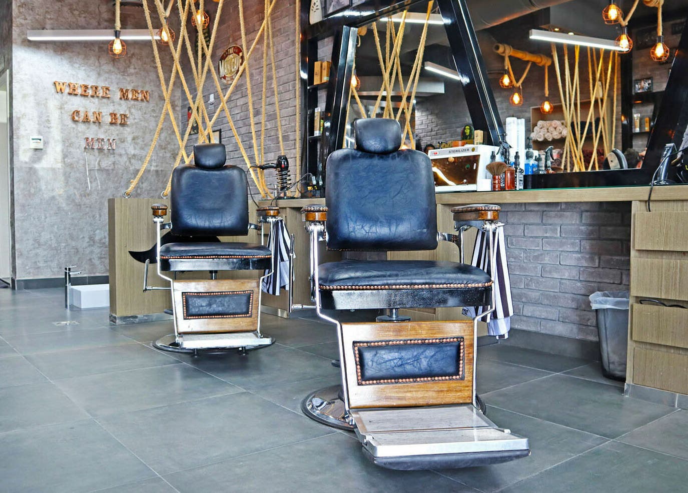 Elegant barber chairs at Classic Vibes Gents Salon in Dubai, Dubai, AE, offering a premium grooming experience.