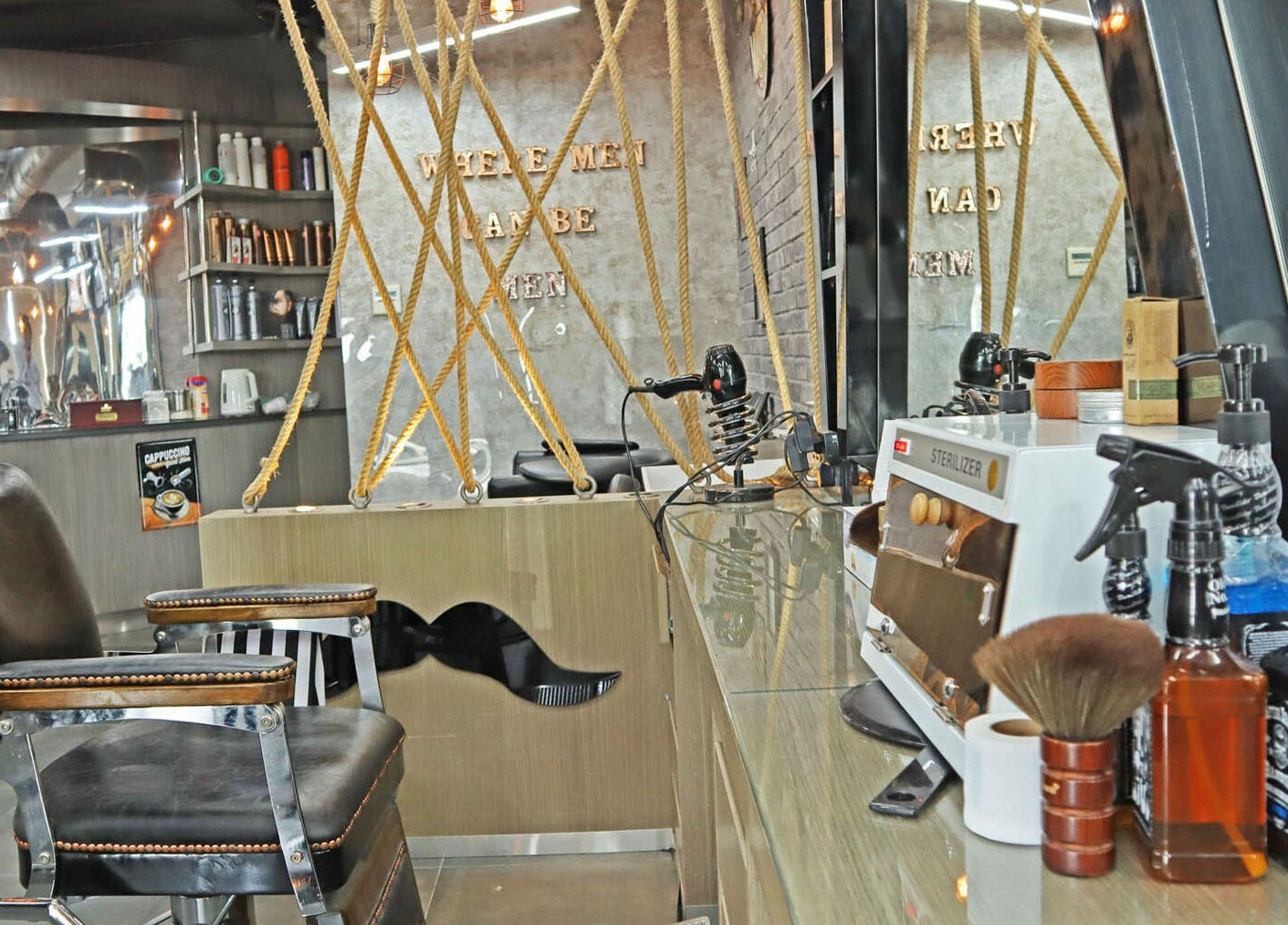 Barber chair and tools at Classic Vibes Gents Salon, Dubai, Dubai, AE, showcasing sleek interior design.