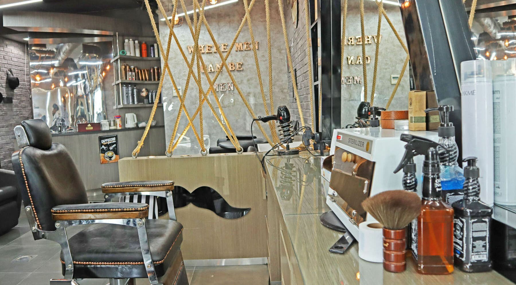 Barber chair and tools at Classic Vibes Gents Salon, Dubai, Dubai, AE, showcasing sleek interior design.