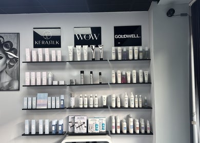 Sophisticated product shelves at Alaan Williams Hair Experts, Pontypridd, Wales, GB featuring premium hair care brands.