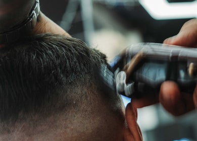 Close-up of a haircut at Frankston Barbers, Melbourne, Victoria, AU, showcasing precise clipper work.