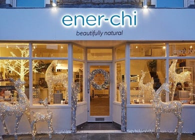 Front view of Ener-Chi Penarth in Wales, GB, with illuminated reindeer decorations and welcoming ambiance.