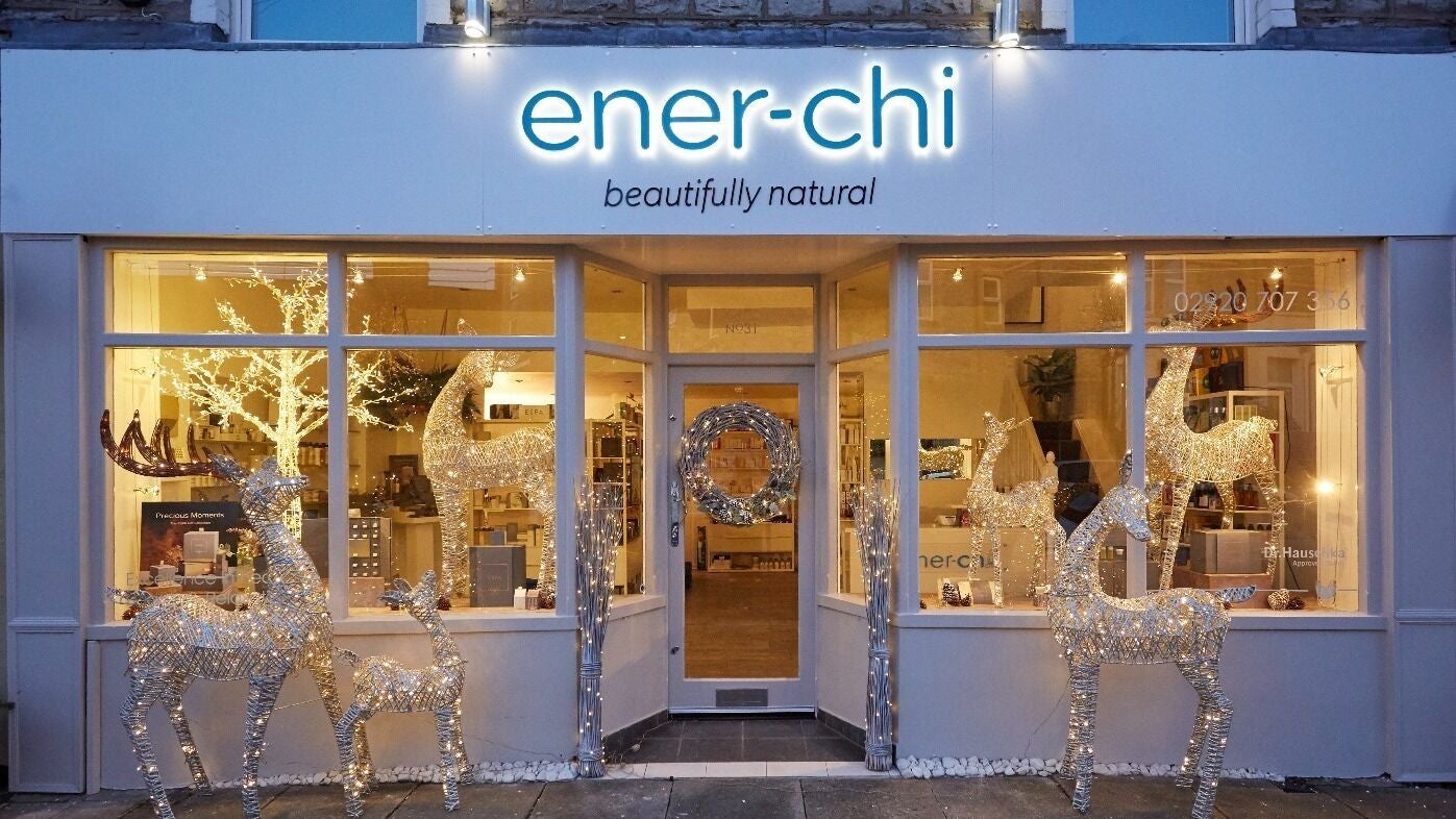 Front view of Ener-Chi Penarth in Wales, GB, with illuminated reindeer decorations and welcoming ambiance.