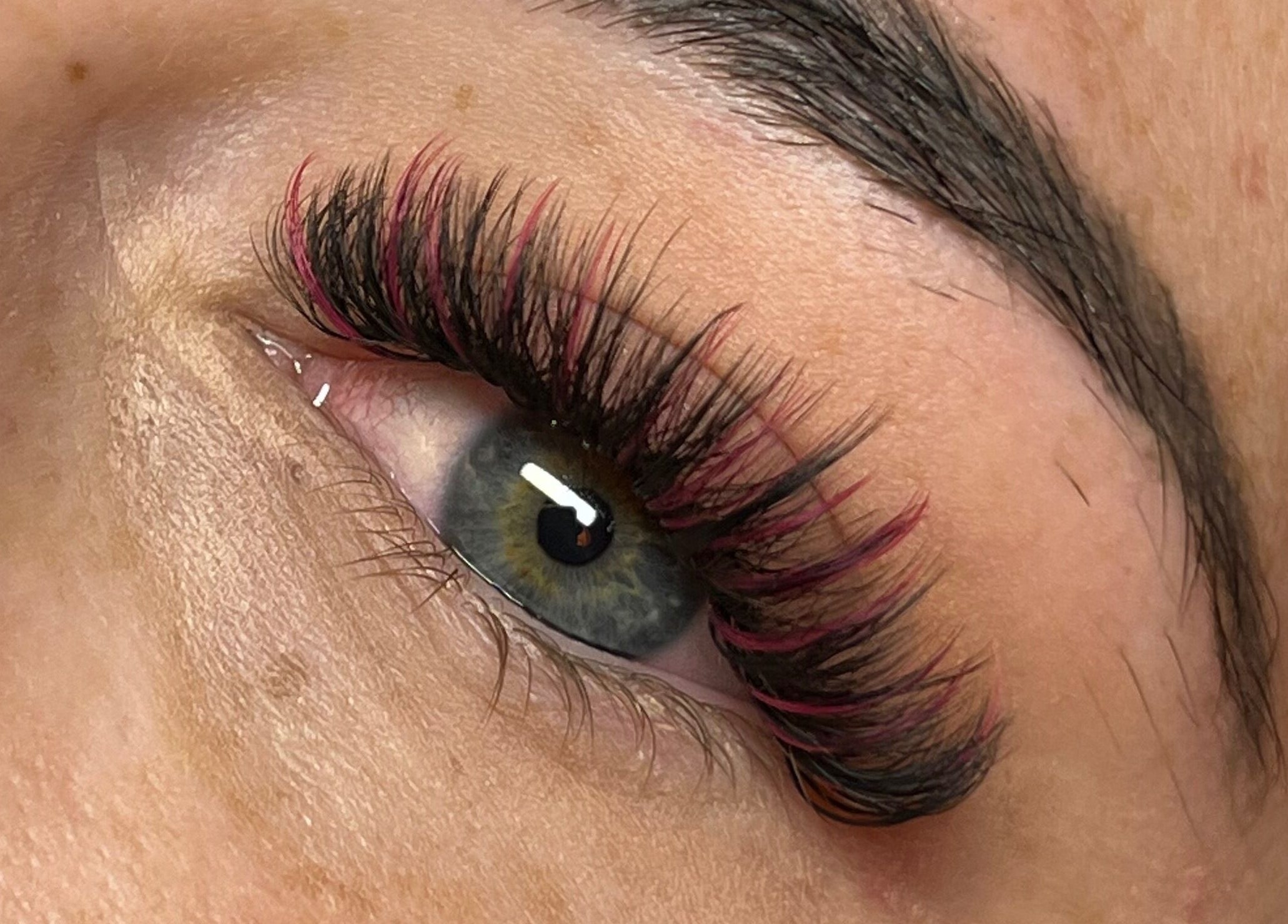 Close-up of eyelash extensions at Leigh Mac, Opelika, Alabama, US, showcasing detailed artistry.