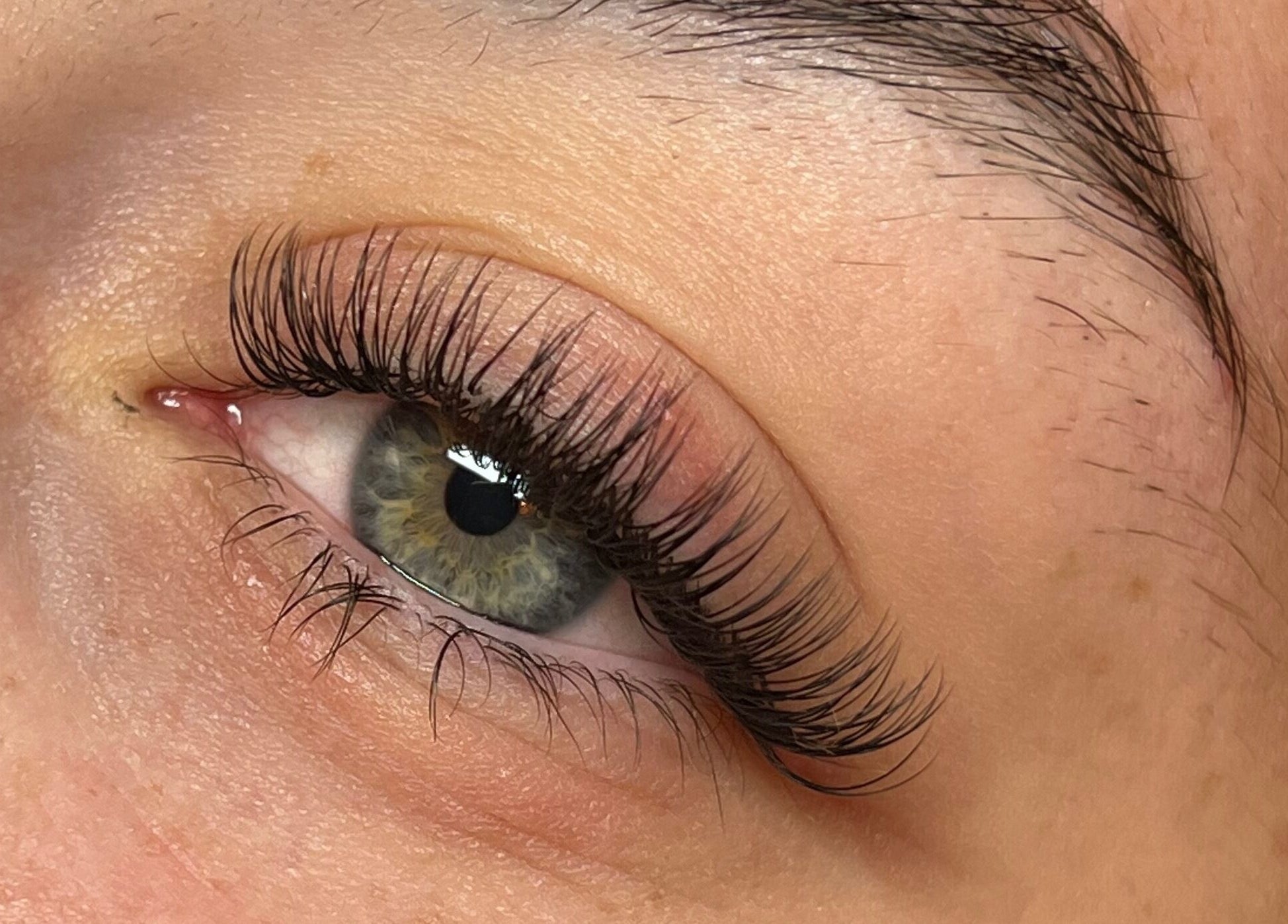 Close-up of elegant eyelash extensions at Leigh Mac in Opelika, Alabama, US.