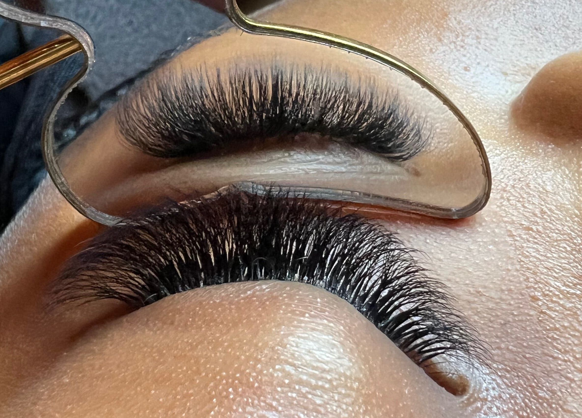 Close-up of expertly styled lashes at Leigh Mac, Opelika, Alabama, US, showcasing precision and beauty.
