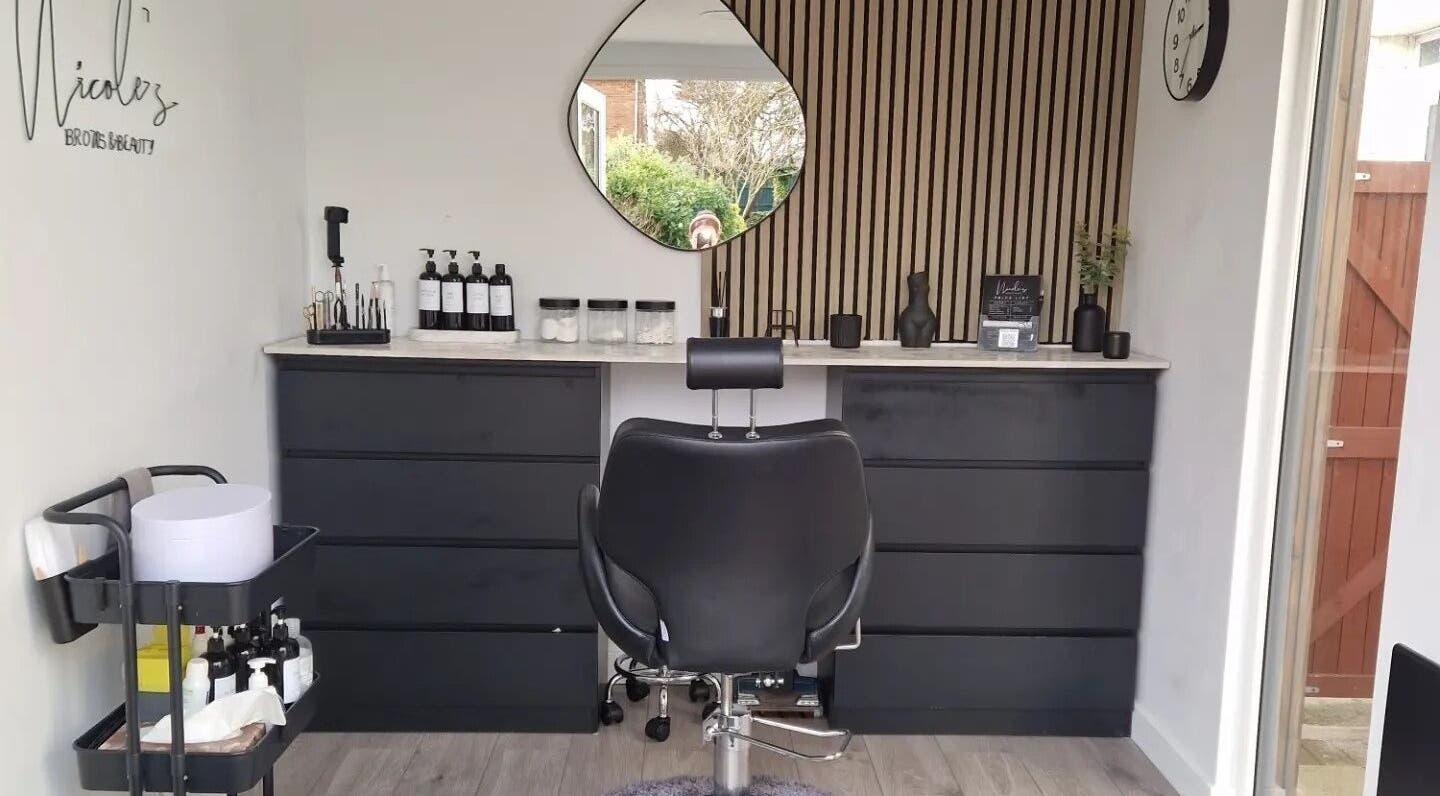 Modern beauty station at Nicole's Brows and Beauty, Sheerness, England, GB, featuring elegant decor and tools.