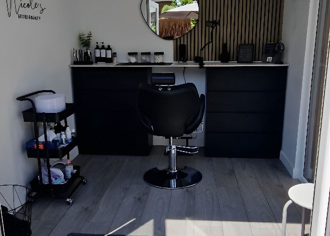 Salon interior at Nicole's Brows and Beauty, Minster On Sea, England, GB, featuring stylish furniture and décor.