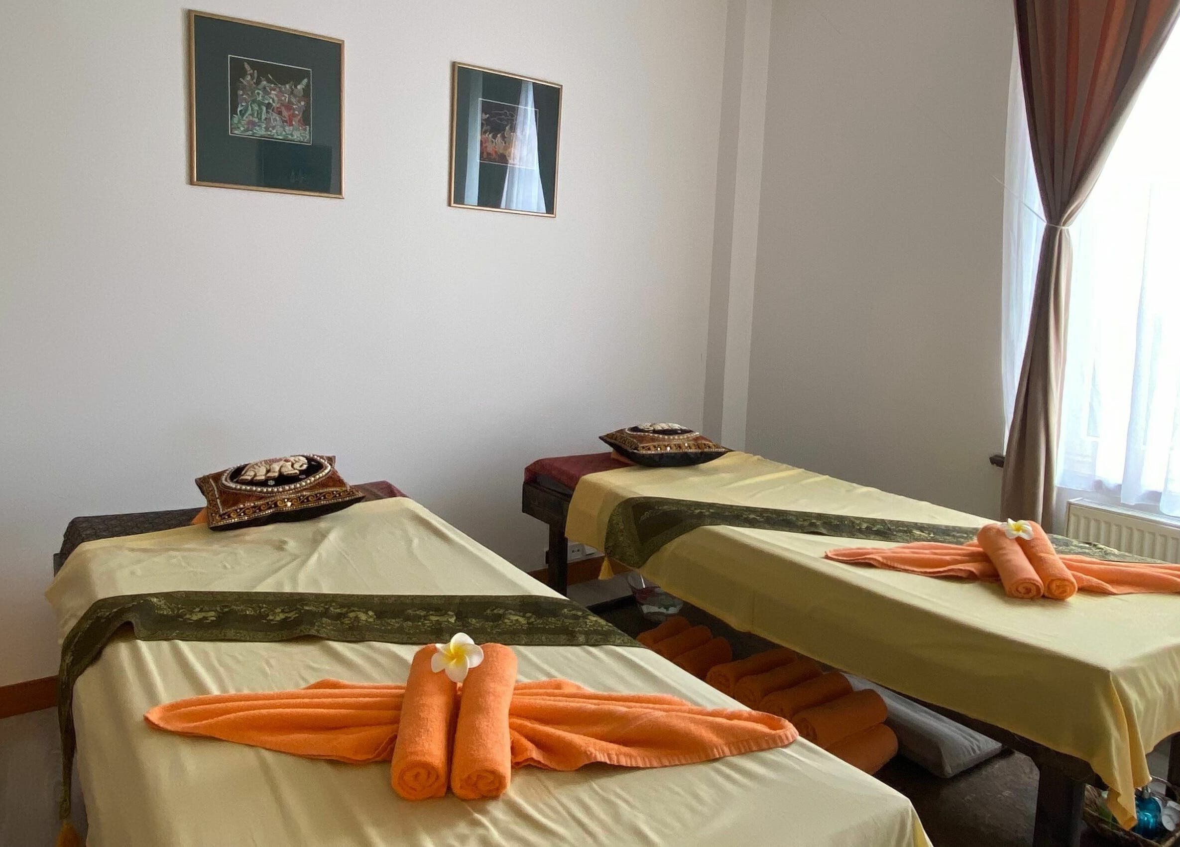 Calming massage room at Gold Hand Thai Massage | Prague 6, Praha 6, CZ, featuring two therapy beds.