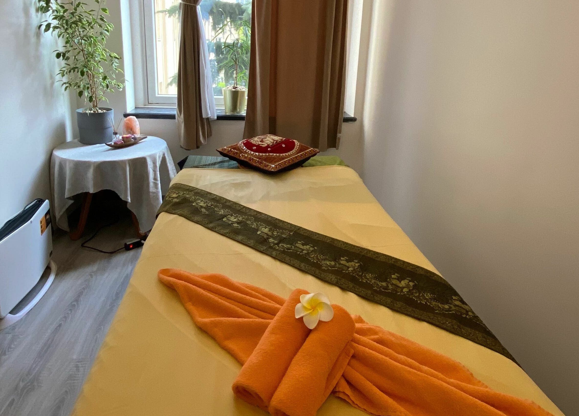 Relaxing massage room at Gold Hand Thai Massage | Prague 6 with peaceful decor in Praha 6, CZ.