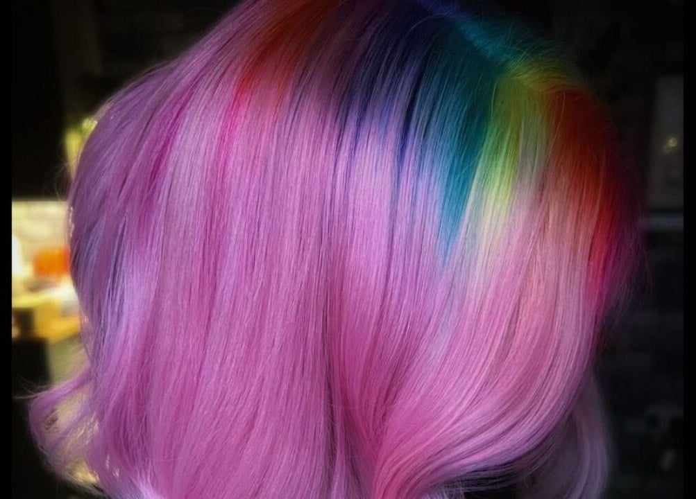 Colorful hair styling at Colouring On The Spectrum, Inverness, Scotland, GB showcasing vibrant hues.