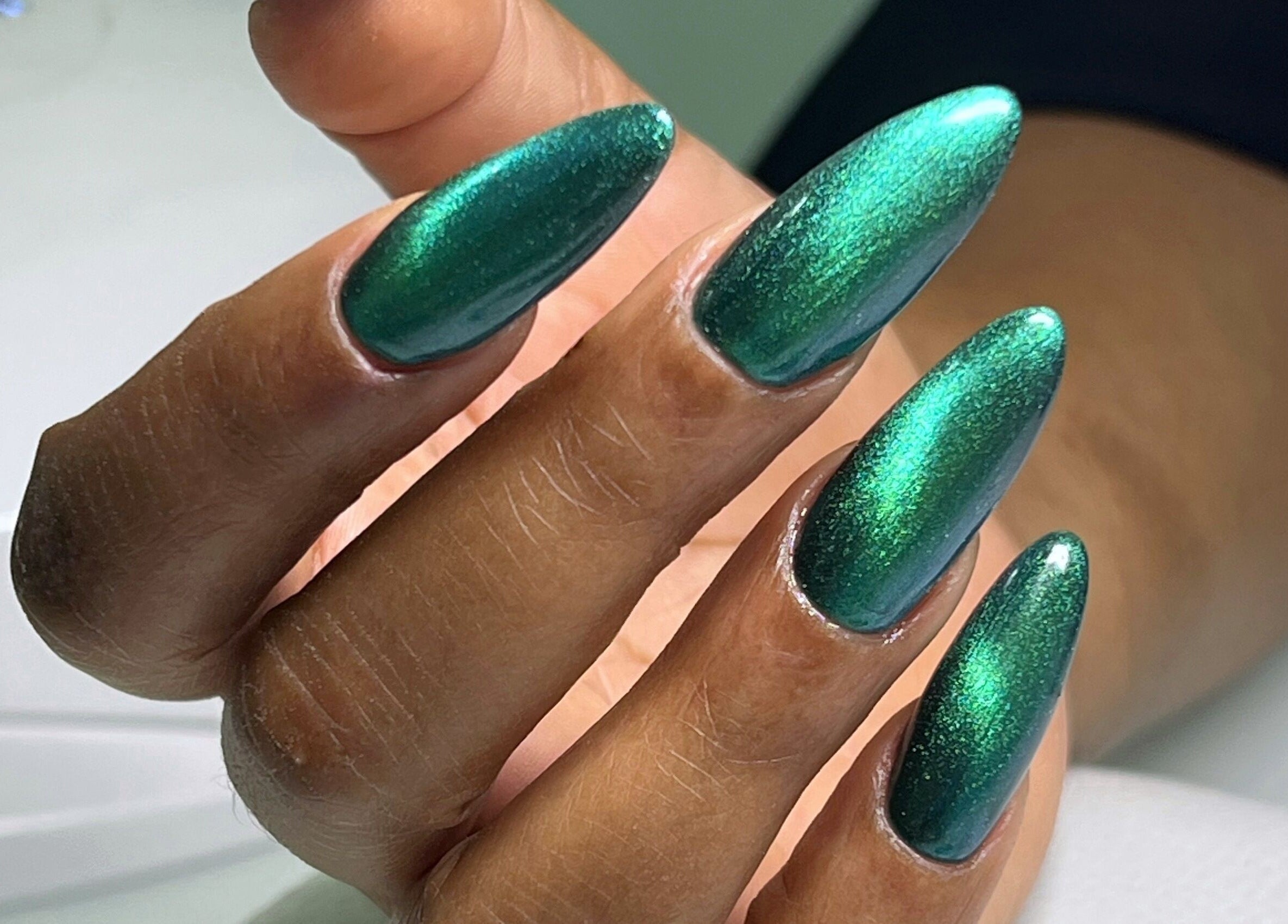 Stunning emerald manicure at Nail Salon Qualitatif in Port Elizabeth, Eastern Cape, ZA.