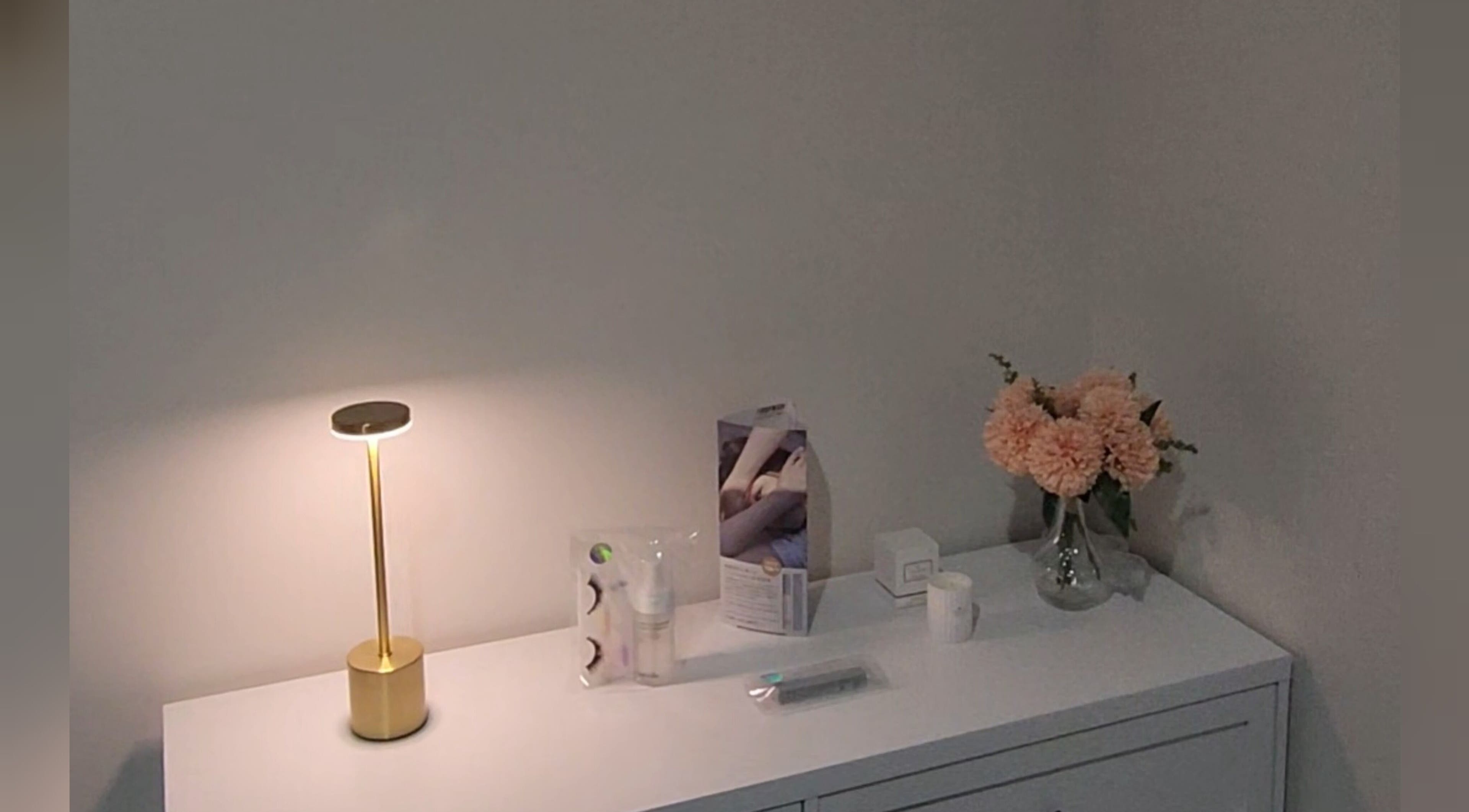 Chic dresser with flowers and products at Lashes by Megumi - Point Cook, Point Cook, Victoria, AU.