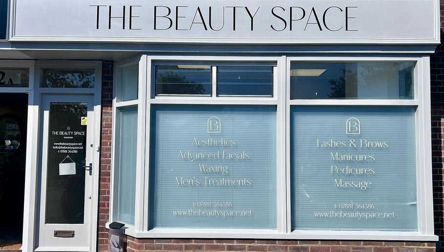 Front view of The Beauty Space in Guildford, England, GB with services displayed on windows.