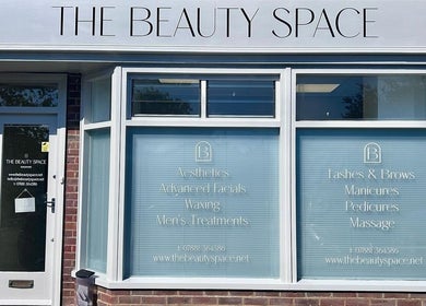 Front view of The Beauty Space in Guildford, England, GB with services displayed on windows.