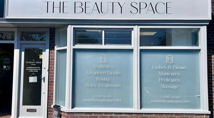 Front view of The Beauty Space in Guildford, England, GB with services displayed on windows.