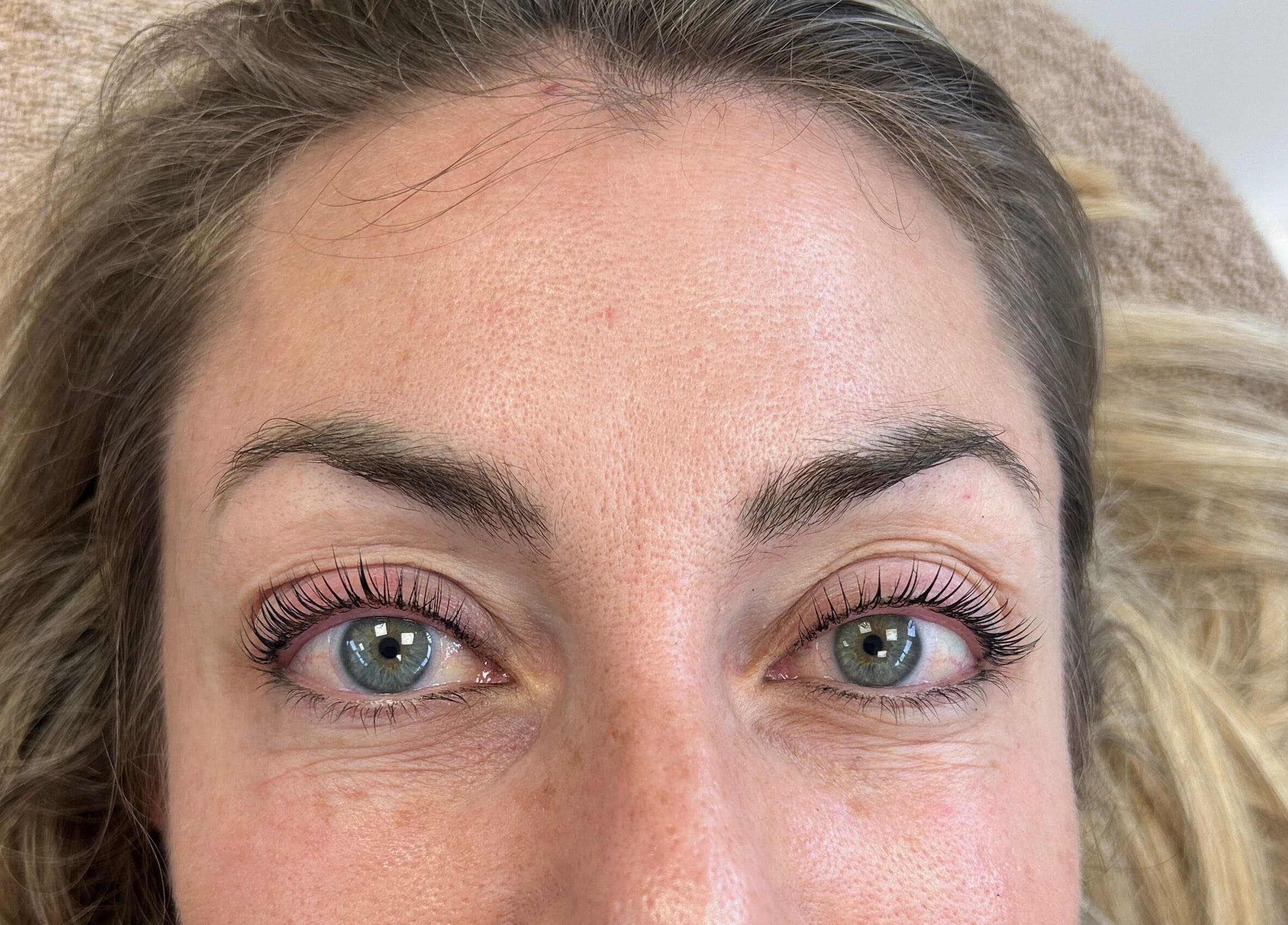 Close-up of a woman's eyes with lifted lashes at The Beauty Space, Guildford, England, GB.