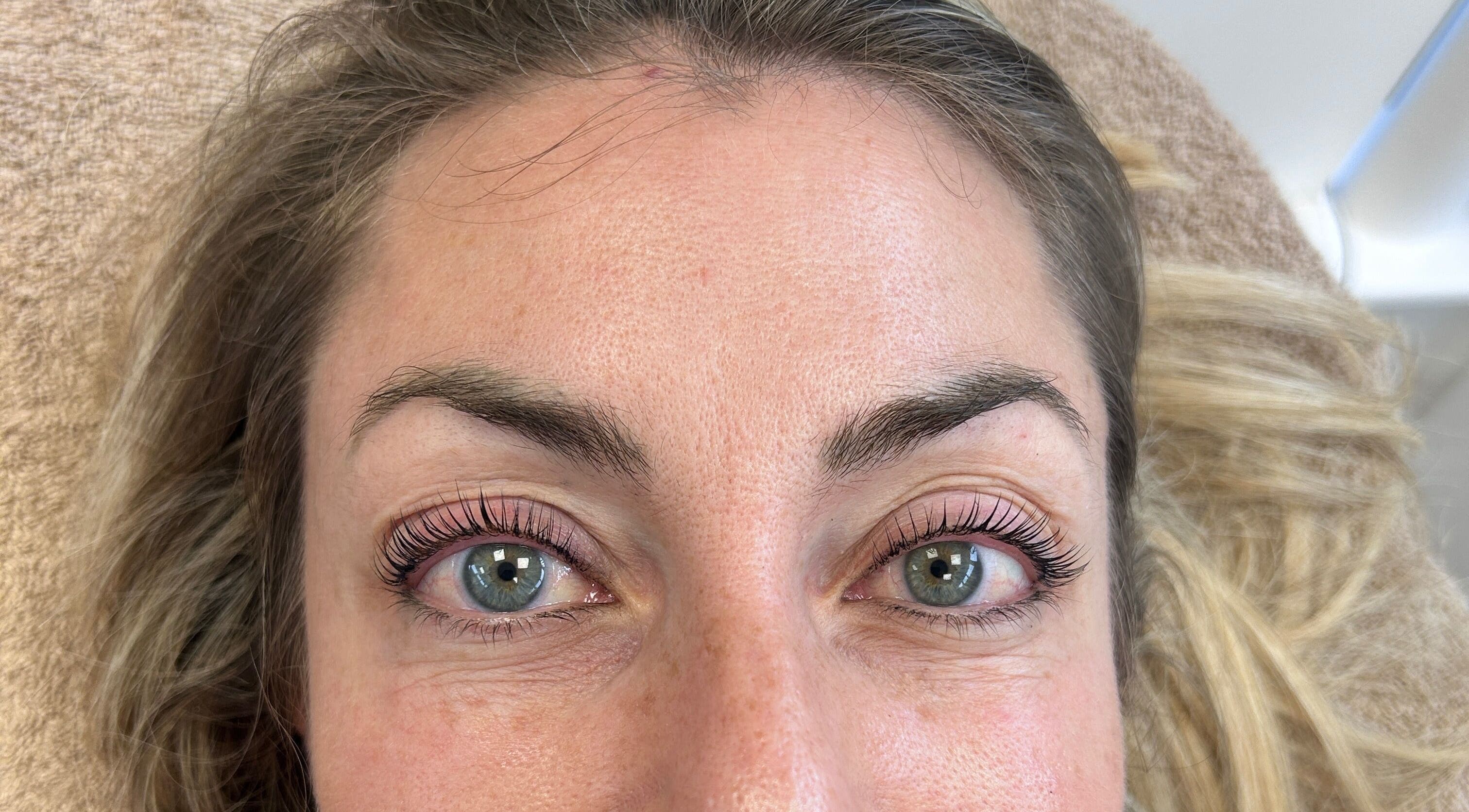 Close-up of a woman's eyes with lifted lashes at The Beauty Space, Guildford, England, GB.