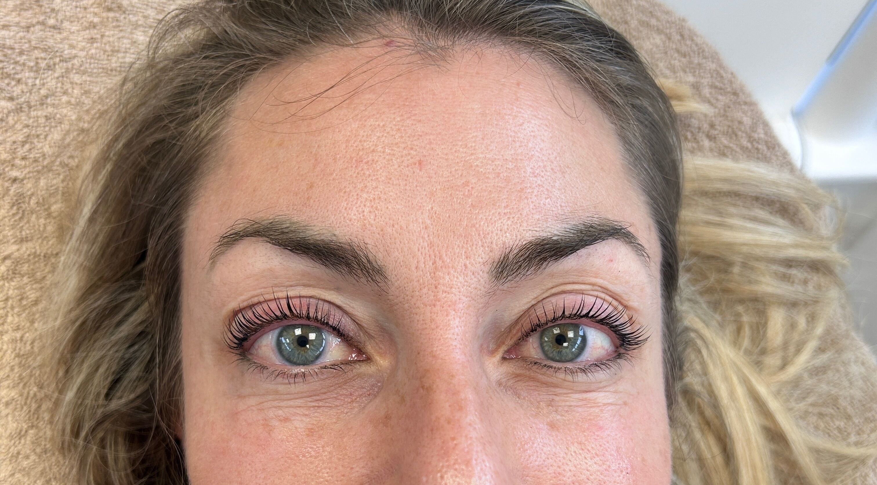 Close-up of a woman's eyes with lifted lashes at The Beauty Space, Guildford, England, GB.