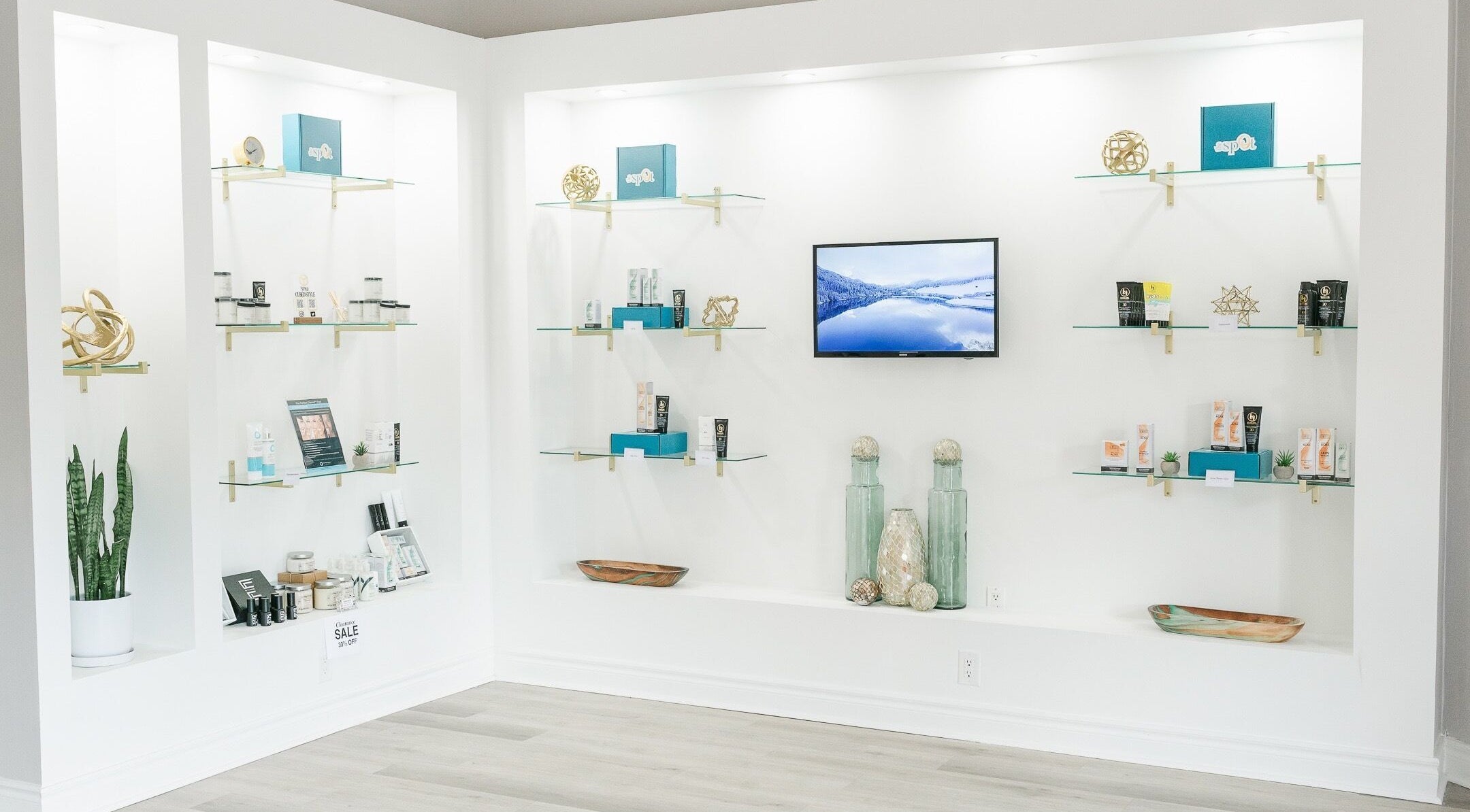 Sleek product display at The O Spot Skin Care Clinic, Ajax, Ontario, CA featuring skincare items.