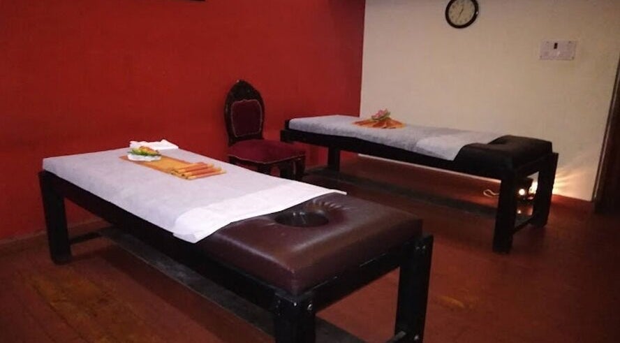 Relaxing massage room at Body Raaga Wellness Spa - Whitefield, Bengaluru, Karnataka, IN with two massage tables.
