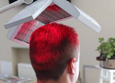 LED hair therapy session at Complete Care Therapy, Ashmore, Queensland, AU for enhanced wellness experience.