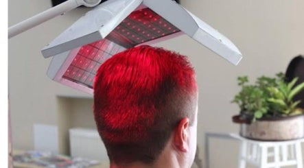 LED hair therapy session at Complete Care Therapy, Ashmore, Queensland, AU for enhanced wellness experience.
