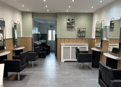 Elegant interior of Zig-Zag Hair & Beauty, Normanton, England, GB, showcasing modern hairdressing stations.