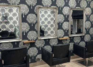 Luxurious mirrors and chairs at Zig-Zag Hair & Beauty, Normanton, England, GB, showcasing elegant interiors.