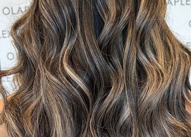Beautiful wavy hair styled at Zig-Zag Hair & Beauty in Normanton, England, GB showcasing expert hair techniques.