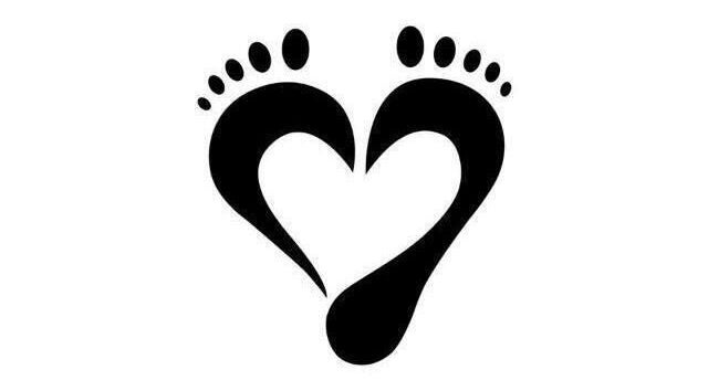 Footprint heart logo for The Whole Sole, a wellness venue in Johannesburg, Gauteng, ZA.
