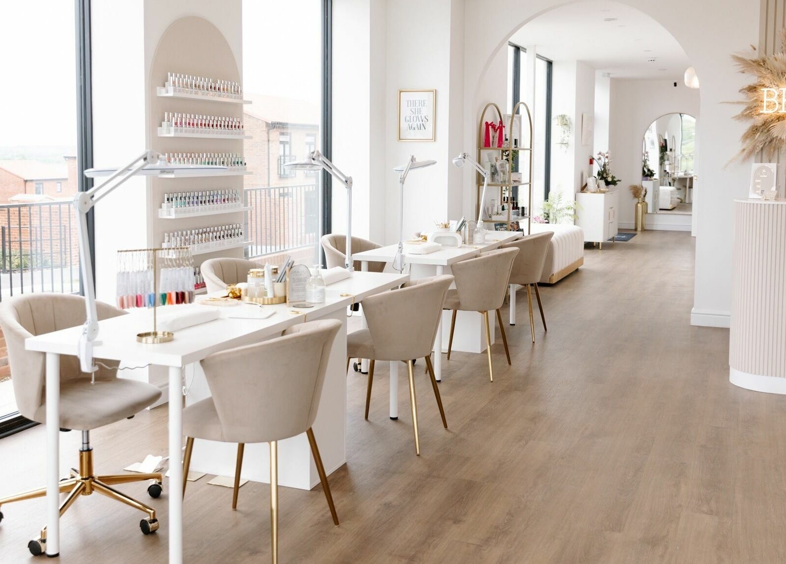 Bright, modern interior of The Beauty Studio in Canterbury, England, GB, featuring chic nail stations and a welcoming vibe.
