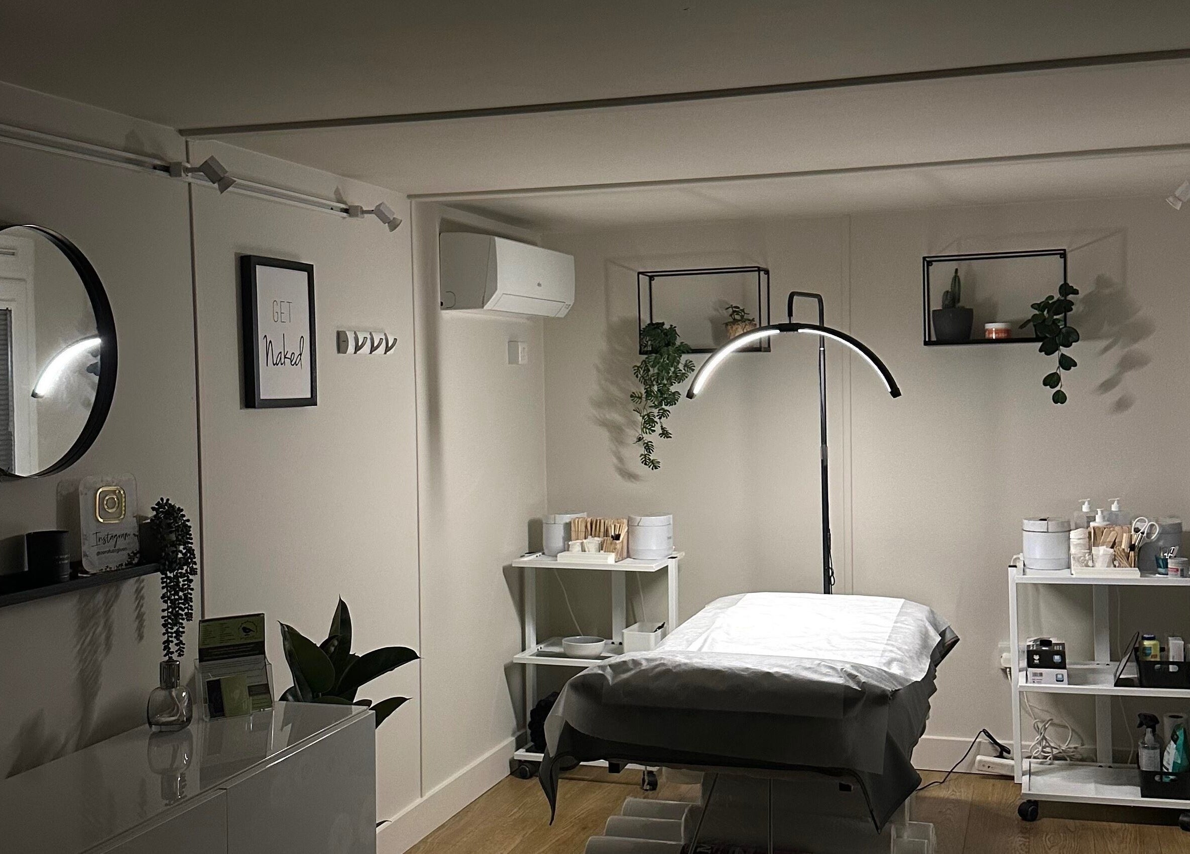 Zero Fuzz Given, Chicksands, England, GB - Relaxing beauty room setup with soothing decor and treatment bed.