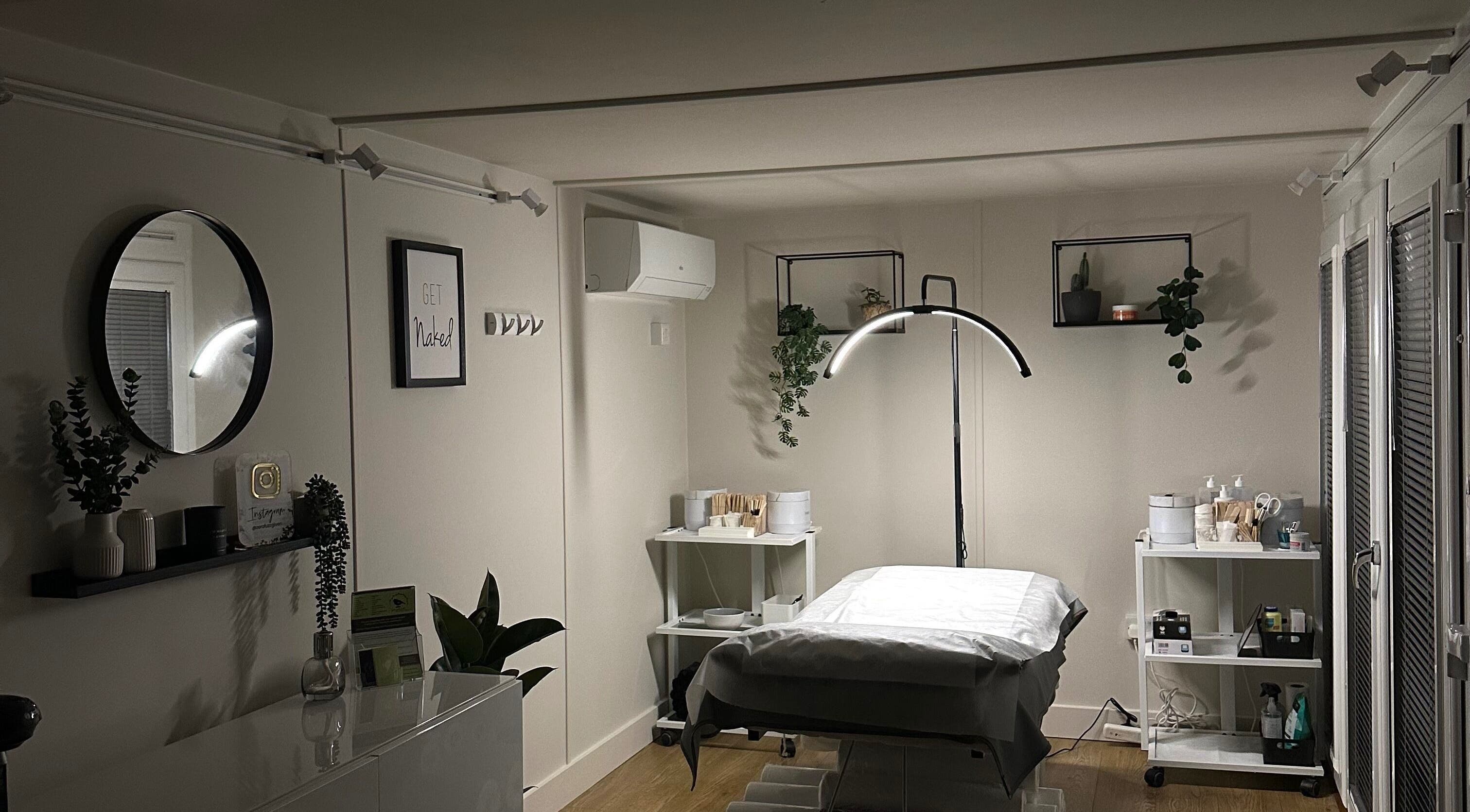 Zero Fuzz Given, Chicksands, England, GB - Relaxing beauty room setup with soothing decor and treatment bed.