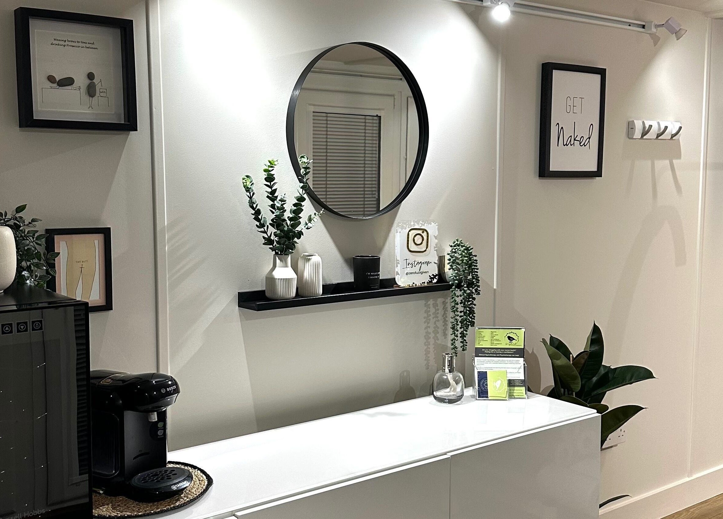 Elegant interior of Zero Fuzz Given in Chicksands, England, GB featuring modern decor and mirrors.