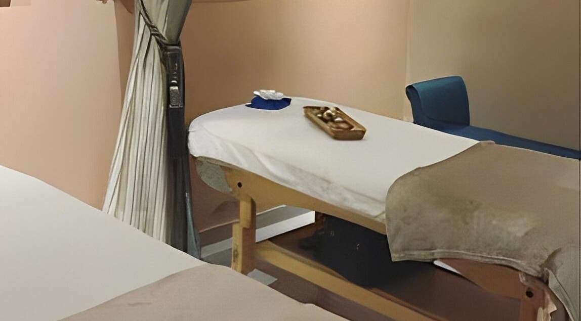 Calming massage room at Rejuvenee Spa & Wellness Center, Lagos, Lagos, NG featuring a serene bed setup.