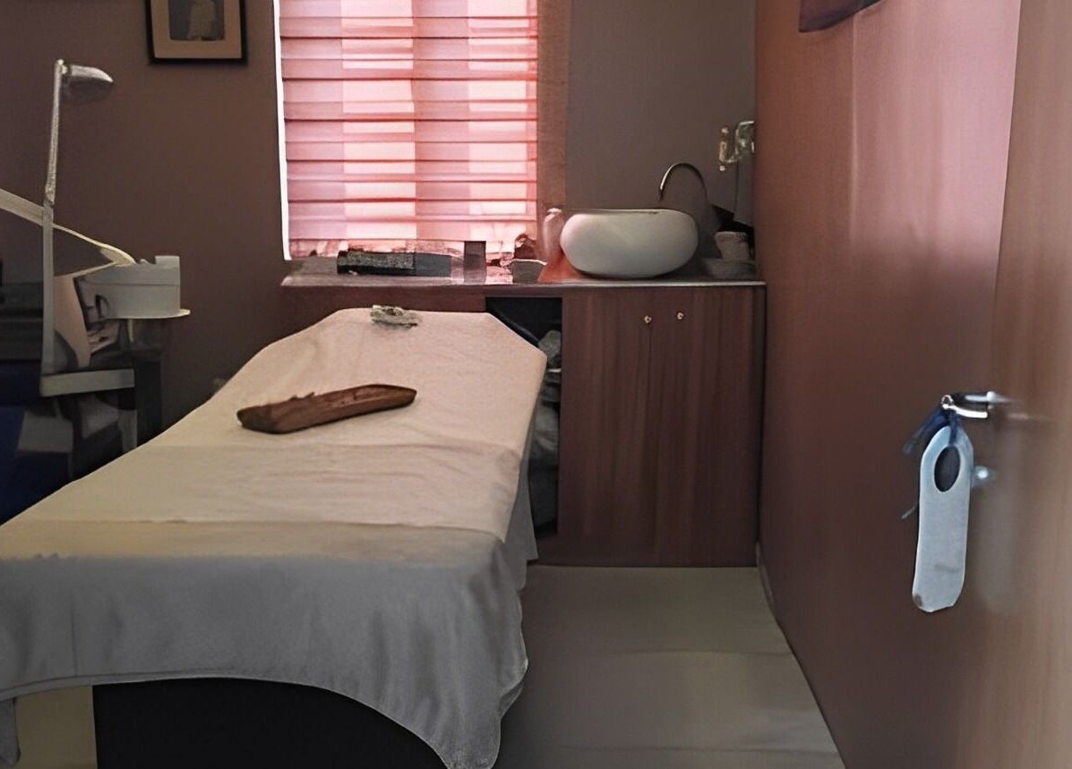 Tranquil massage room at Rejuvenee Spa & Wellness Center, Lagos, Lagos, NG, embodying relaxation and wellness.
