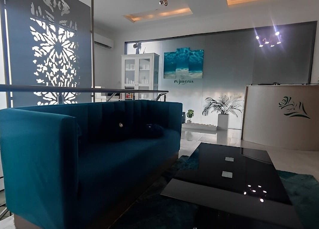 Relaxing lobby area at Rejuvenee Spa & Wellness Center, Lagos, Lagos, NG featuring modern decor and seating.