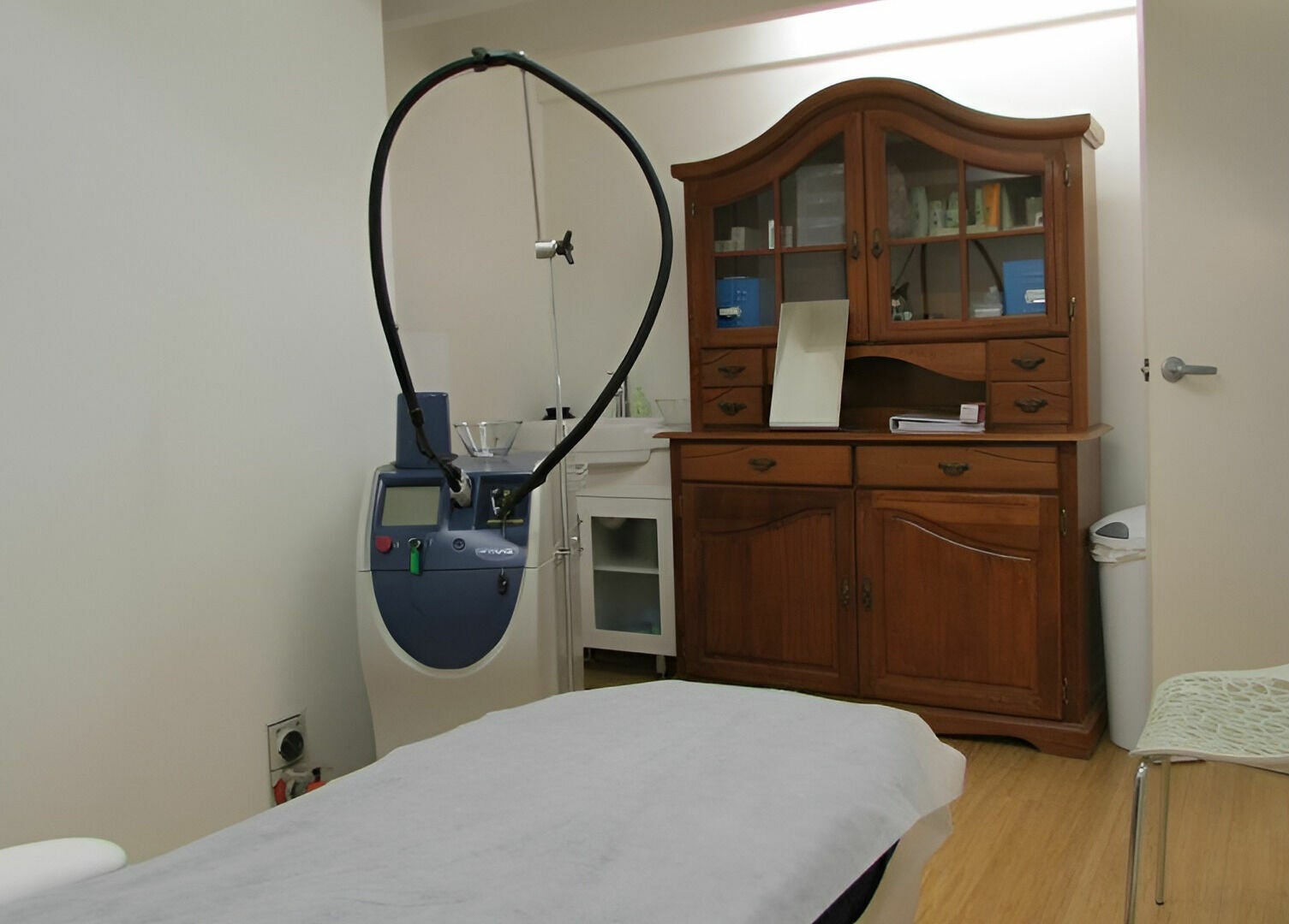 Modern laser treatment room at Helios Laser Studio, Melbourne, Victoria, AU showcasing advanced equipment.